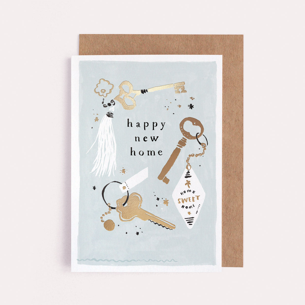 A keys new home card with gold foil details from Sister Paper Co.