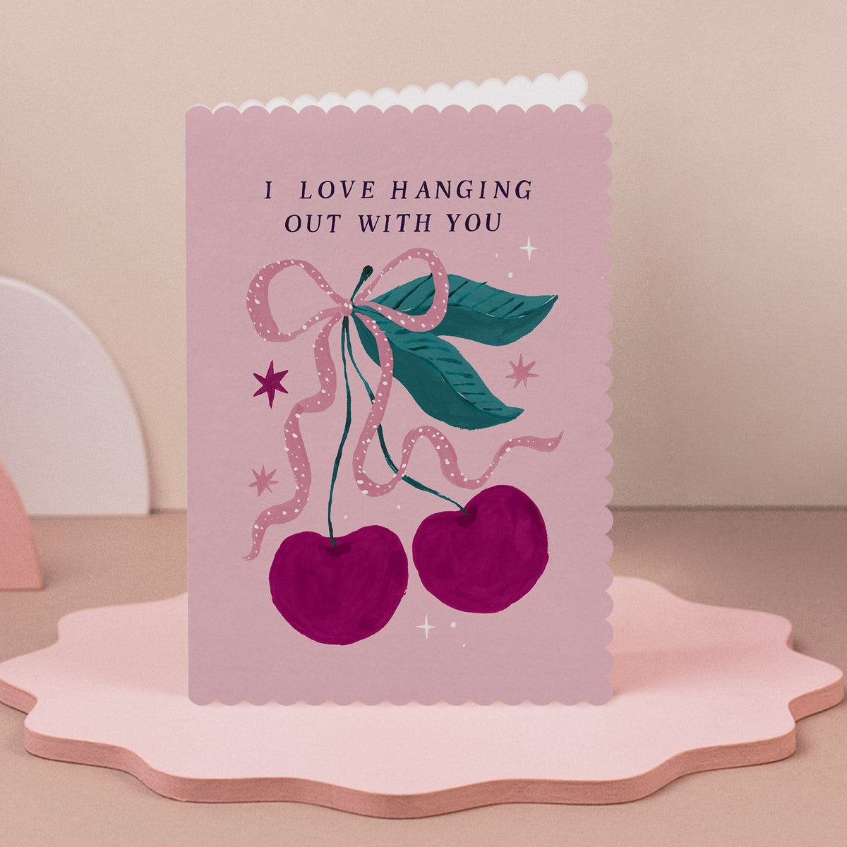Cherries love card design shown close up