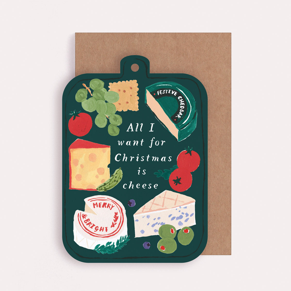 Christmas Card with cheese board-themed artwork and text 'All I want for Christmas is cheese' cut into the shape of a cheeseboard.