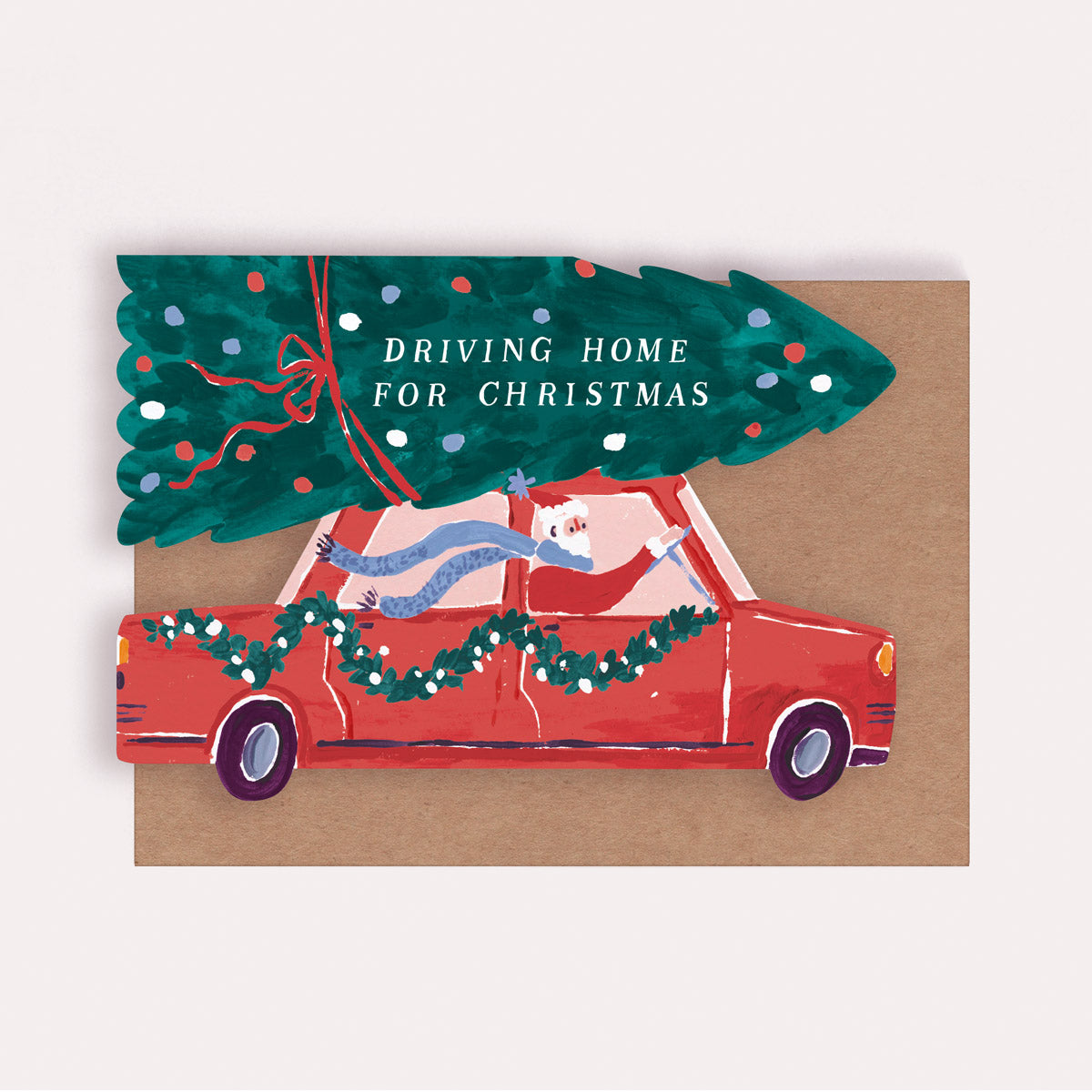 Christmas card with a red car, Santa, and Christmas tree cut into a unique shape