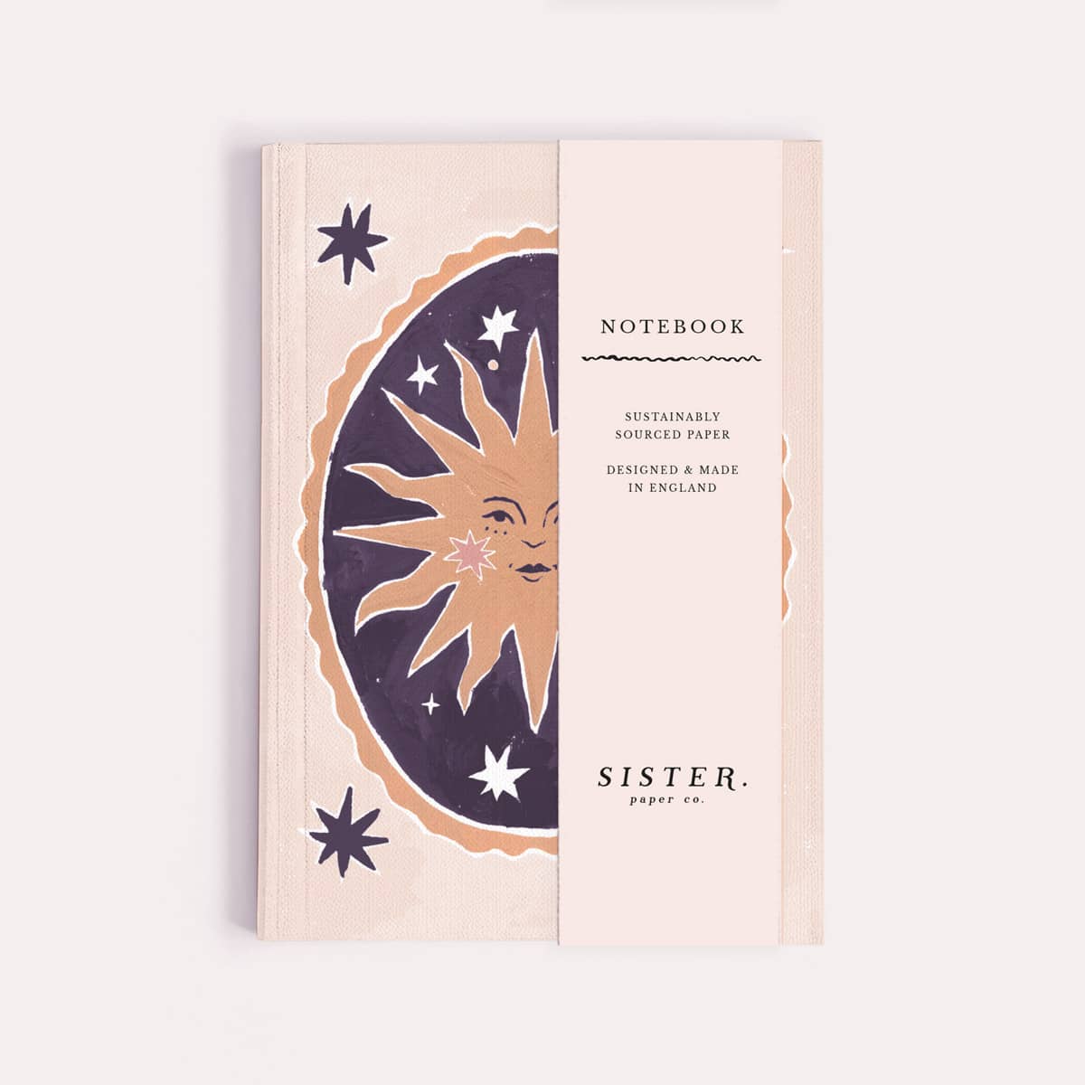 Smiling sun pocket notebook shown close up