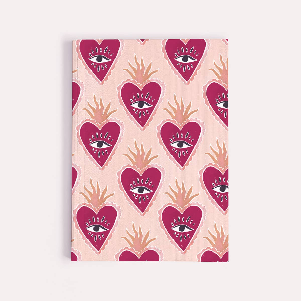 Sacred heart pocket notebook, A6 plain page journal with a flaming hearts cover