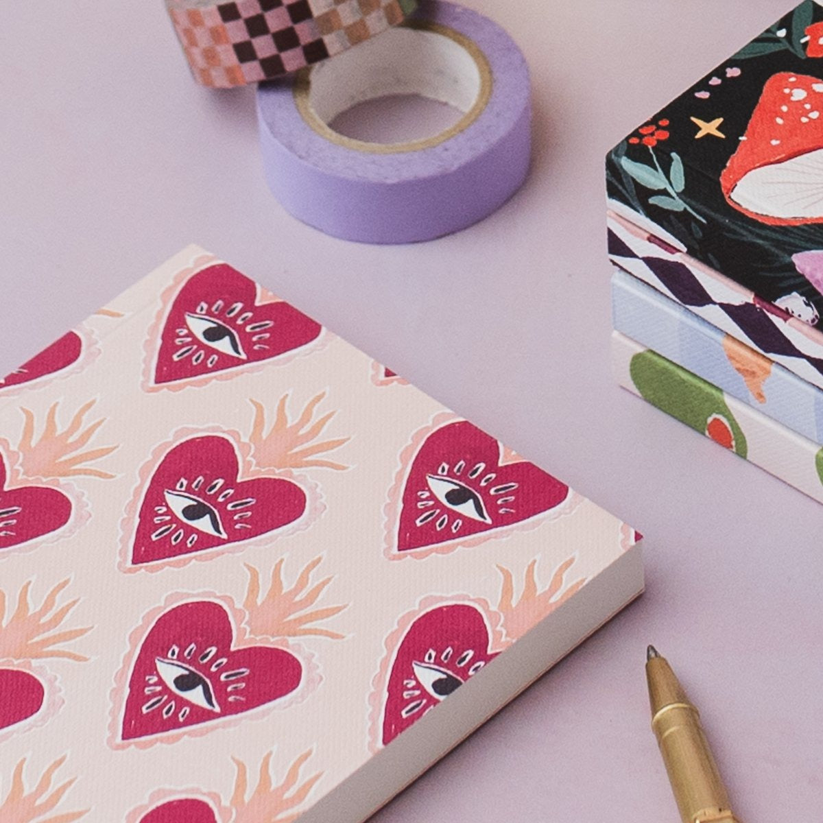 Sacred heart pocket notebook styled with props