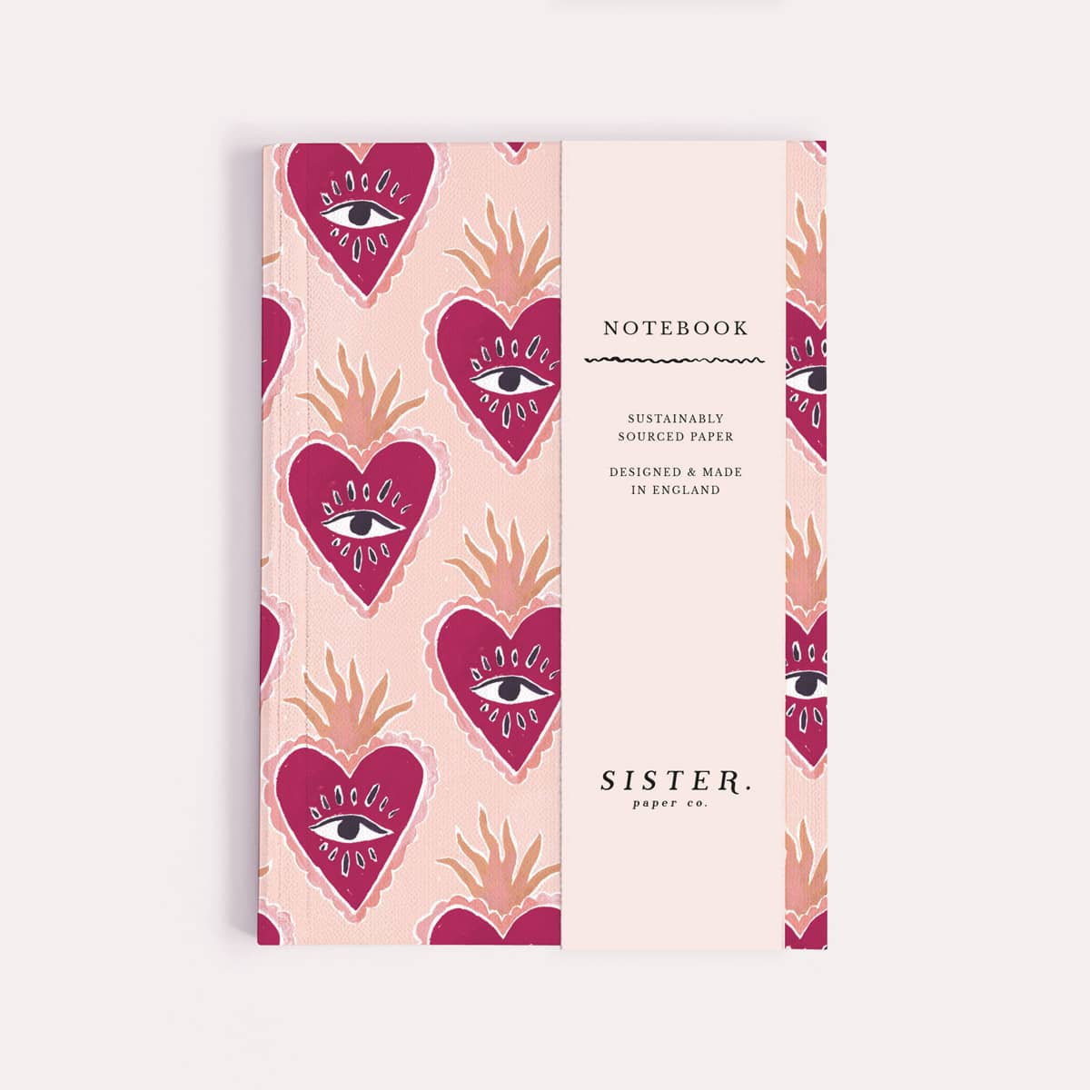 Sacred heart pocket notebook shown close up