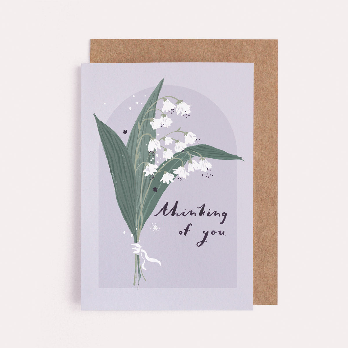 A Thinking Of You card with hand-painted Lily of the Valley flowers. From the Solstice collection at Sister Paper Co.