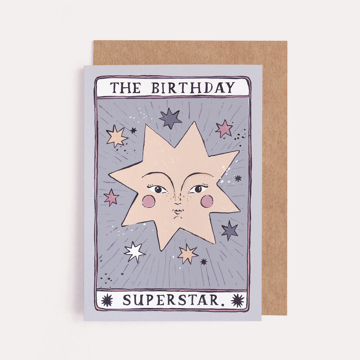 A handmade tarot card style card with illustrated beautiful face and birthday superstar hand lettering on a birthday card from the female birthday card collection at Sister Paper Co.