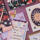 Amazing parents new baby card styled with props