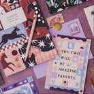 Amazing parents new baby card styled in a flat lay