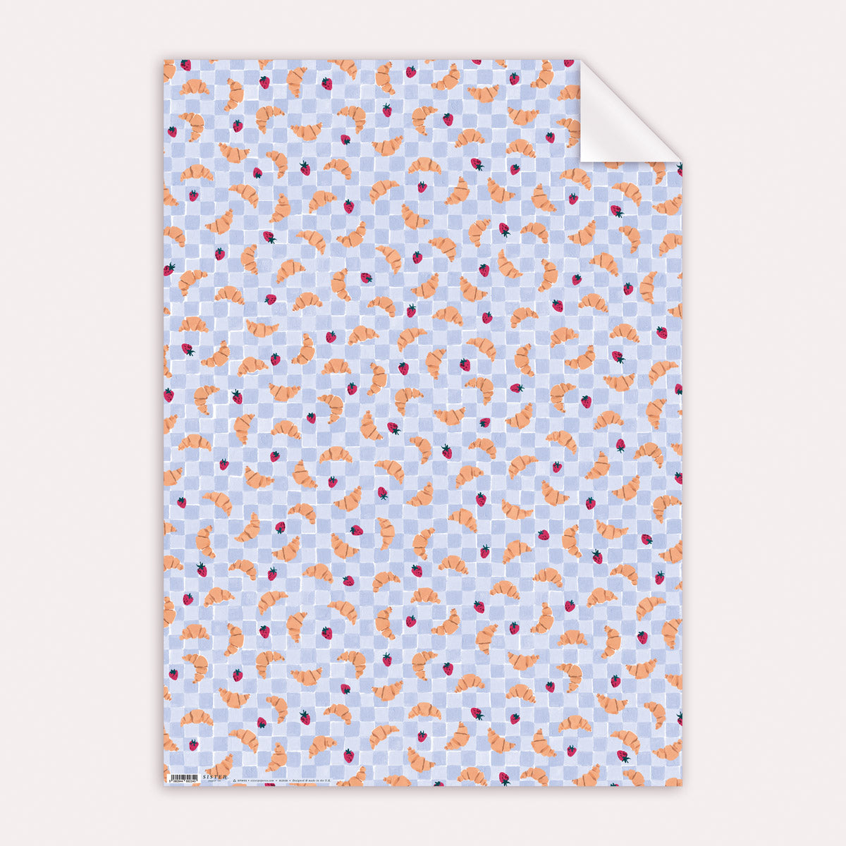 Flat croissant gift wrap sheet showing the full croissants and strawberries pattern