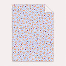 Flat croissant gift wrap sheet showing the full croissants and strawberries pattern