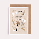 A love card with with gold foil pasta details from Sister Paper Co.