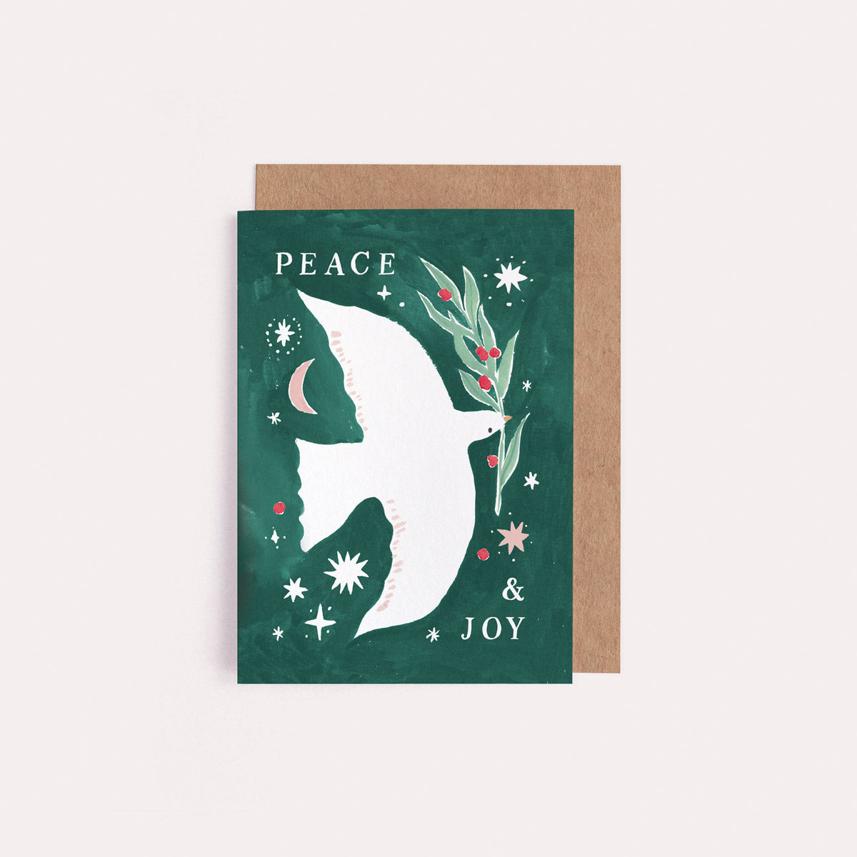 A mini Christmas card with an illustrated peace dove from the wholesale mini Christmas card collection at Sister Paper Co.