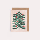 A mini Christmas card with an illustrated Christmas tree from the wholesale mini Christmas card collection at Sister Paper Co.