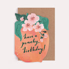 Peach-shaped fruity birthday card with blossoms and the caption 'Have A Peachy Birthday'