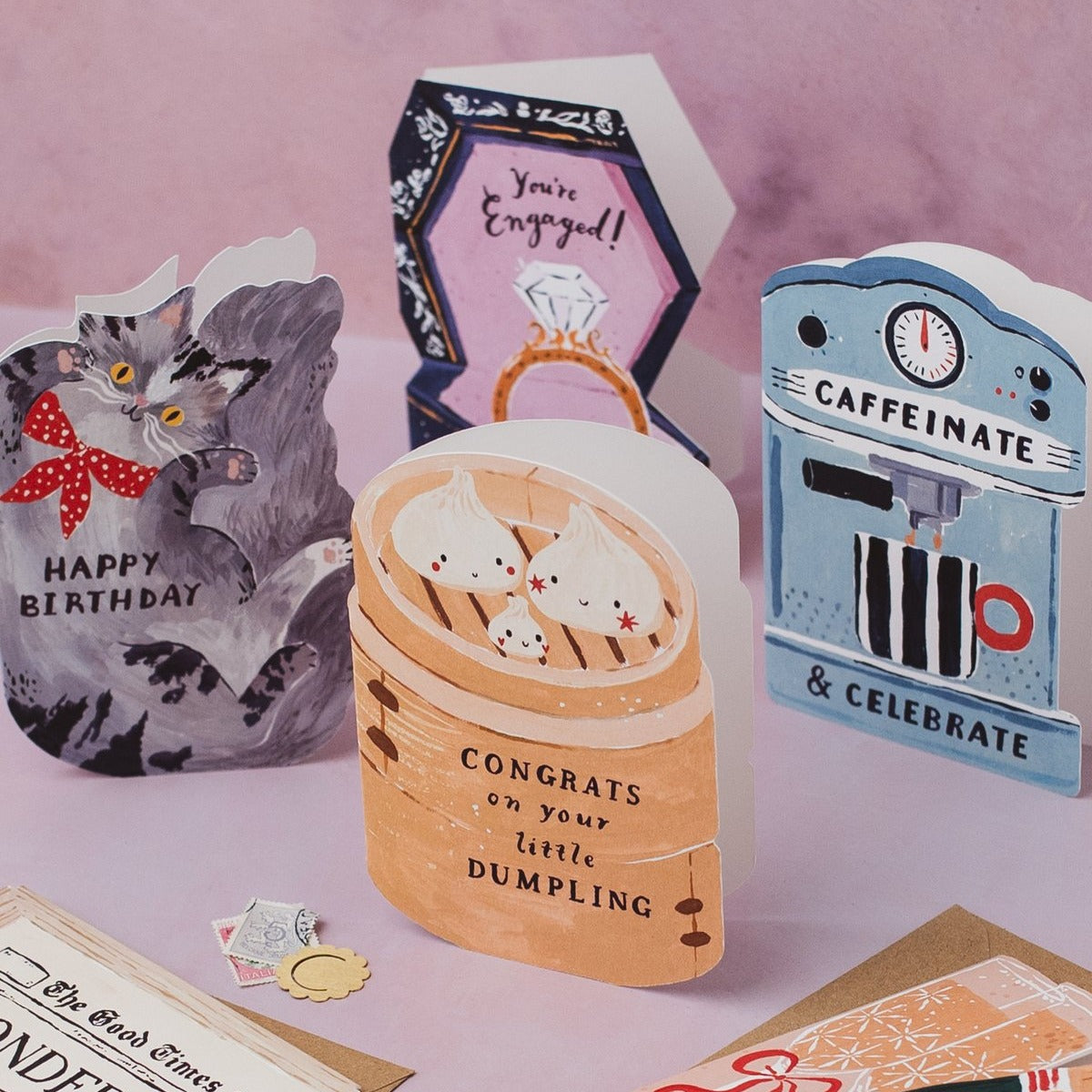 Dumpling new baby card styled with props