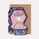 Ring box shaped engagement and congratulations card with a diamond ring and the caption 'You're Engaged!'