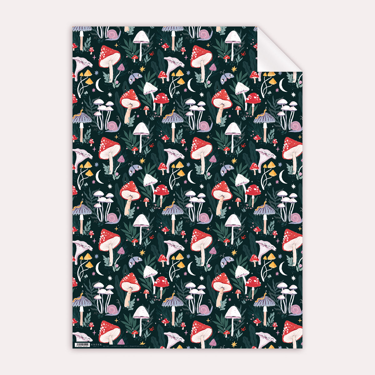 A mystical mushrooms print on this mushroom gift wrap from the wholesale wrapping paper sheets collection at Sister Paper Co.