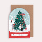 A Christmas card cut into the shape of a snow globe from the wholesale Christmas card collection at Sister Paper Co.