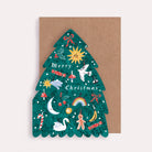 A Christmas card cut into the shape of a Christmas tree from the wholesale Christmas card collection at Sister Paper Co.