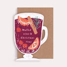 Christmas Card cut into the shape of a crystal mug of mulled wine with mulled wine and Christmas time text.