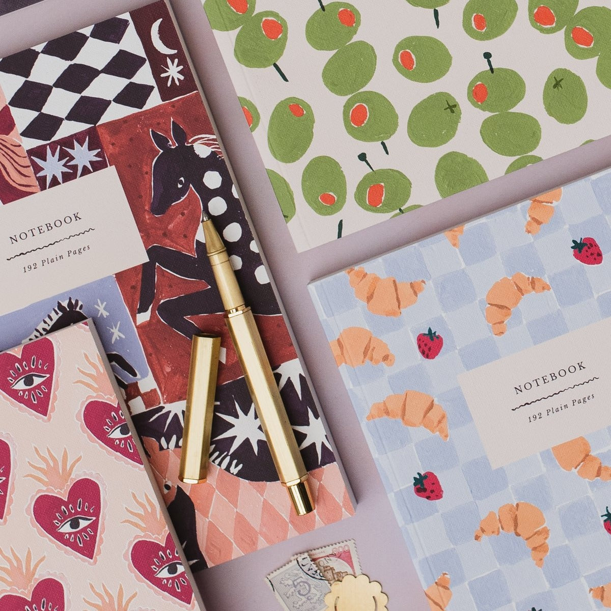 Croissant Cafe notebook styled in a flat lay