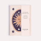 Smiling sun pocket notebook shown close up