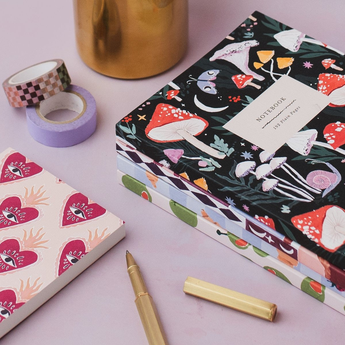 Sacred heart pocket notebook styled in a flat lay