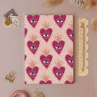 Sacred heart pocket notebook shown from the back