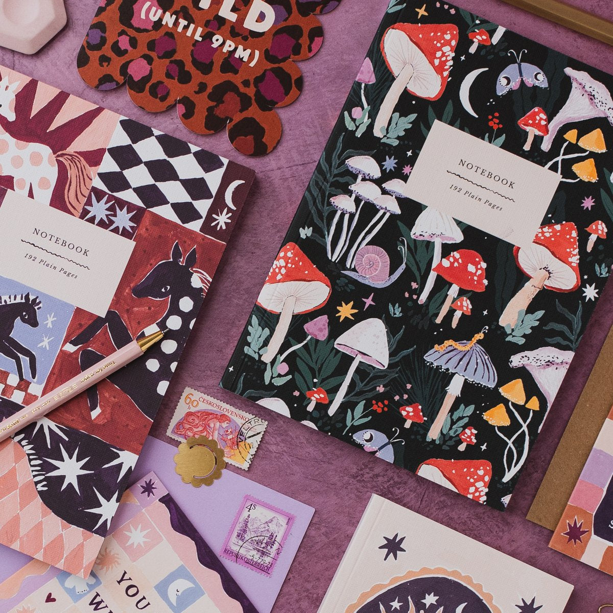 Sister Paper Co cards and notebooks displayed together