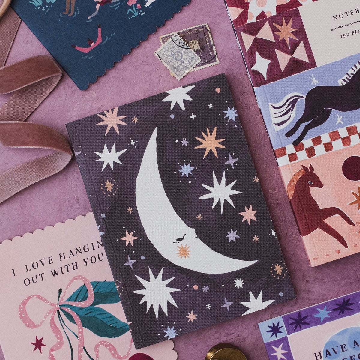 Sister Paper Co cards, notebooks and pocket notebooks styled together