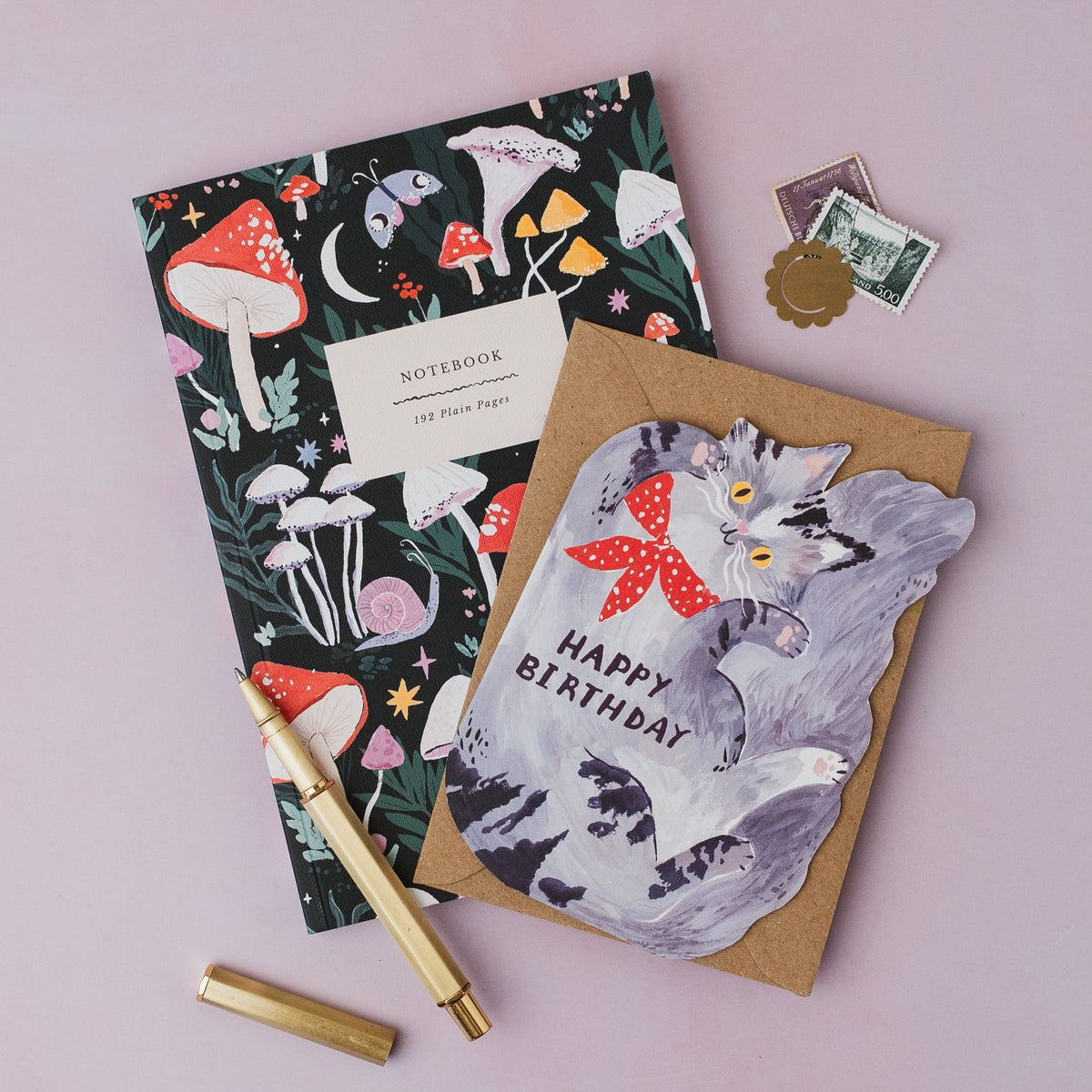Sister Paper Co cat birthday card and notebook styled together