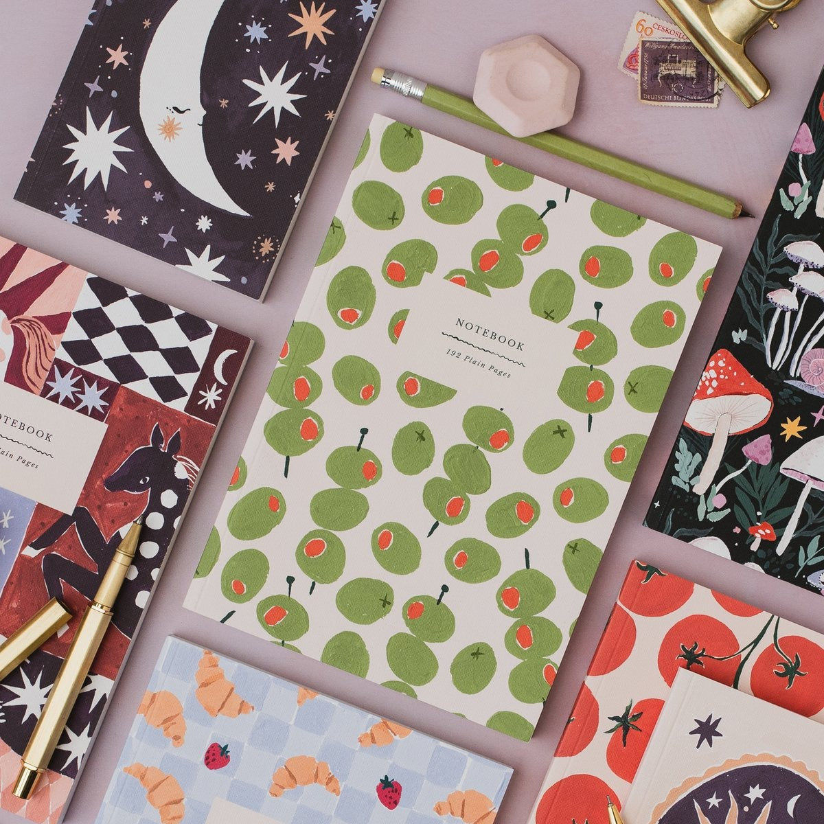 Sister Paper Co notebooks and pocket notebooks in a styled flat lay