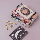 Sister Paper Co pocket notebooks in a styled flat lay