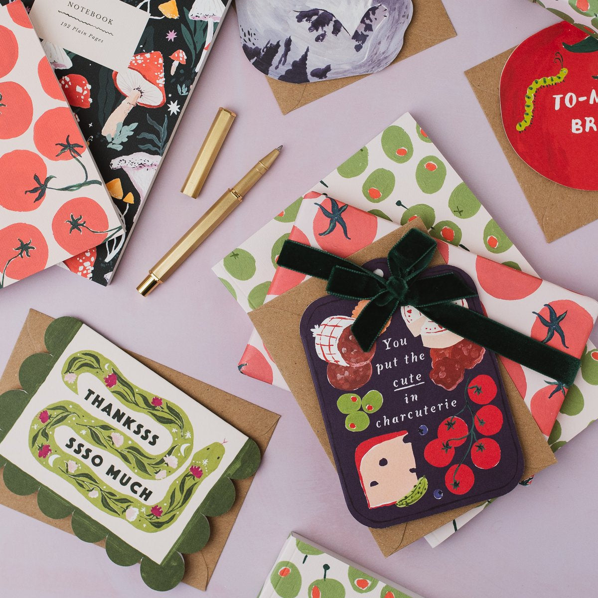 Sister Paper Co cards, notebooks and gift wrap displayed together