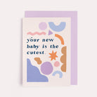 A gender neutral baby card with illustrated shapes and hand lettering on a new baby card from the unisex baby collection at Sister Paper Co.