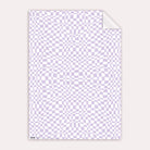 A lilac checkerboard print on wrapping paper from the female birthday wrapping paper collection at Sister Paper Co.